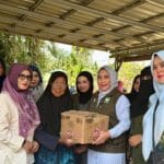 Penyaluran bantuan banjir Aceh Tamiang oleh DWP Aceh kepada warga Desa Purwodadi