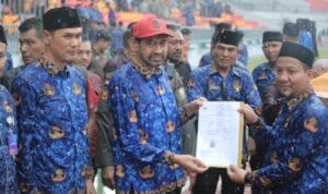 Pelantikan PPPK Paruh Waktu Aceh di Stadion Harapan Bangsa Banda Aceh diguyur hujan deras