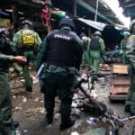 Aparat keamanan Filipina mengamankan lokasi serangan bom granat di Cotabato saat pesta tahun baru.